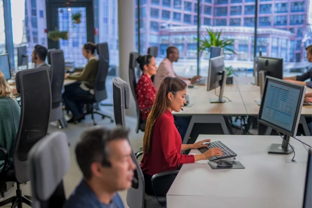 an IT helpdesk team working in an office